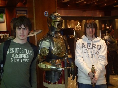 Daniel Frohm and Derek LaBaff with a suit of armor in some Toledo gift shop.