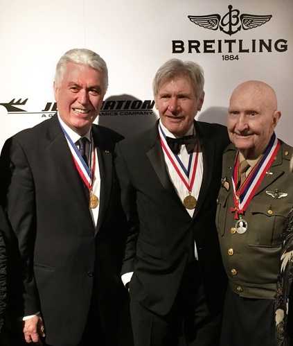 Dieter F. Uchtdorf, Harrison Ford, and Candy Bomber Gail Halvorsen receiving medals from Living Legends of Aviation