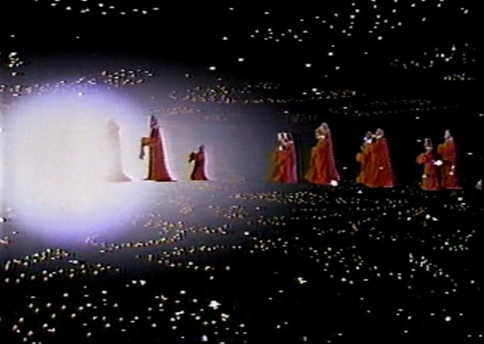The Star Wars Holiday Special: Wookiees in red robes walking through space into a star